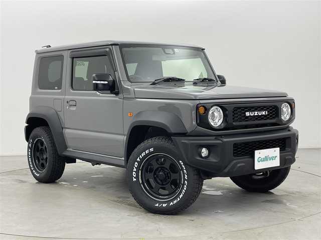 スズキ ジムニー シエラ JC 富山県 2022(令4)年 1.6万km ミディアムグレー ワンオーナー/4WD/8インチ純正ナビ（AM/FM/CD/DVD/USB/BT）/フルセグTV/バックカメラ/デュアルセンサーブレーキサポート/レーンキープアシスト/クルーズコントロール/オートマチックハイビーム/LEDヘッドライト/社外LEDフォグランプ/ダウンヒルアシスト/センターデフロック/フロントマットブラックグリル/純正グリル積込/社外16インチAW/ホワイトレタータイヤ/黒塗り鉄チン付きスタッドレスタイヤ積込（8部山）/純正AW4本積込/前席シートヒーター/OPエアコン口（純正有）/スマートキー×２/プッシュスタート/ドアミラーヒーター/ヘッドライトウォッシャー/取扱説明書/保証書