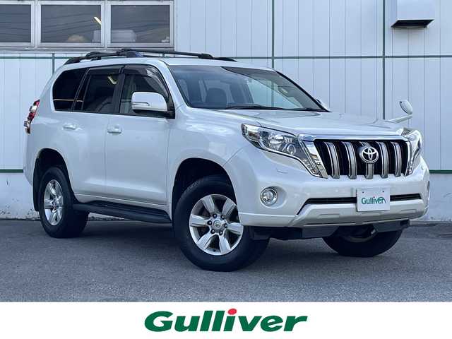 トヨタ ランドクルーザー プラド TX Lパッケージ 山梨県 2016(平28)年 10.7万km ホワイトパールクリスタルシャイン ワンオーナー/4WD/純正SDナビ/フルセグTV/バックカメラ/ETC/前席パワーシート/前席シートヒーター/ステアリングスイッチ/フォグランプ/サイドバイザー/クルーズコントロール/純正17インチアルミホイール/スペアキー1本/取扱説明書/保証書