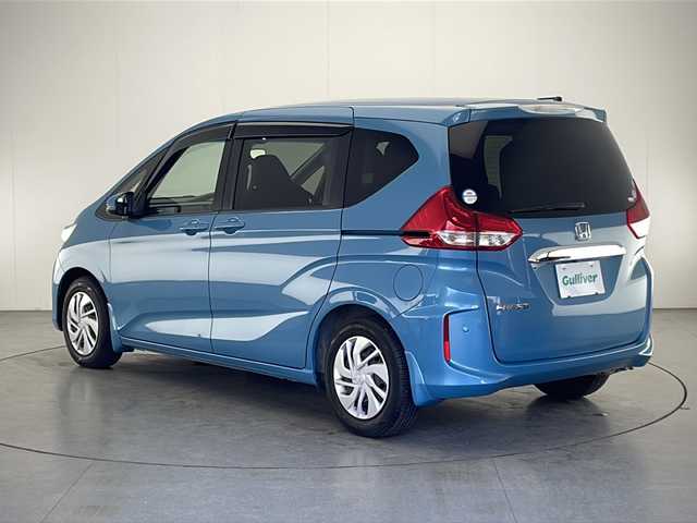 ホンダ フリード G ホンダセンシング 宮崎県 2016(平28)年 3.1万km ブルーホライゾンM 禁煙車/ホンダセンシング/純正ナビTV/（VXM-174VFXi/CD/DVD/Bluetooth/フルセグTV)/純正バックカメラ/純正ビルトインETC/純正フロアマット/両側電動スライドドア/アダプティブクルーズコントロール/レーンディパーチャーアラート/クリアランスソナー/オートエアコン/ウインカードアミラー/スマートキー/プッシュエンジンスタート/スペアキー/新車時保証書/取扱い説明書