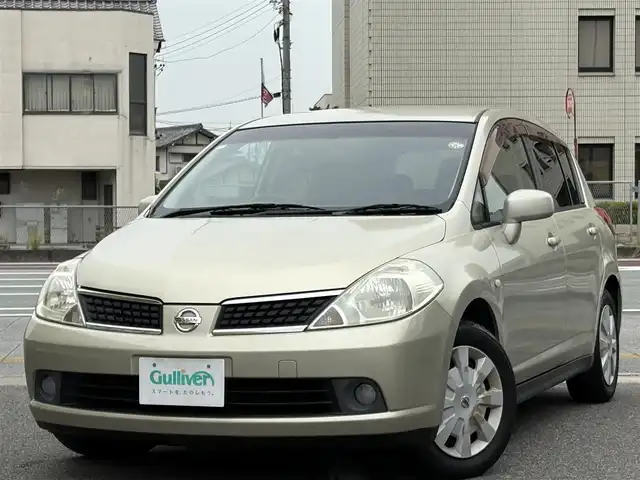 日産 ティーダ 15M+ナビプレミアムネクスト 三重県 2007(平19)年 8万km ウォームシルバー ♪ワンオーナー /インテリキー /スペアキー/純正ナビ/ドライブレコーダー/フォグライト/オートライト/電格ミラー/革巻ステアリング/ヘッドライトレベライザー/プライバシーガラス/フロアマット　/ドアバイザー