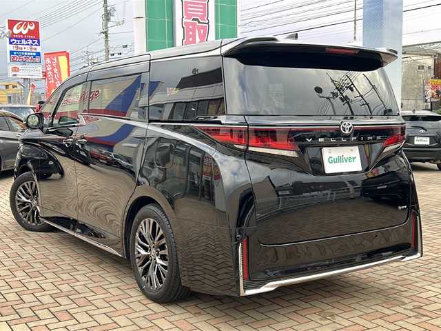 トヨタ ヴェルファイア ハイブリット Z プレミア 鳥取県 2025(令7)年 0.7万km ブラック 法人ワンオーナー/スマートキーx2個/パノラマルーフ/ブラックレザーシート/デジタルインナーミラー（ドラレコ）/メーカー14インチナビゲーション/フルセグ・HDMI/Bluetooth/フリップダウンモニター/セカンドオットマン/フロント・セカンドエアーシート/フロント・セカンドパワーシート/ウッドコンビハンドル（ヒーター）/ヘッドアップディスプレイ/パドルシフト/置くだけ充電/AC100V電源/電動サンシェード/両側パワースライド/パワーテールゲート/全方位カメラ/パーキングアシスト/インテリジェントソナー/プリクラッシュセーフティ/ブラインドスポットモニタリング/アダクティブクルーズ/オートハイビーム/LEDヘッドライト/クロムメッキ１９AW/ビルトインETC/保証書・スペアキー
