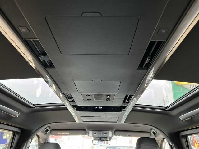 トヨタ ヴェルファイア ハイブリット Z プレミア 鳥取県 2025(令7)年 0.7万km ブラック 法人ワンオーナー/スマートキーx2個/パノラマルーフ/ブラックレザーシート/デジタルインナーミラー（ドラレコ）/メーカー14インチナビゲーション/フルセグ・HDMI/Bluetooth/フリップダウンモニター/セカンドオットマン/フロント・セカンドエアーシート/フロント・セカンドパワーシート/ウッドコンビハンドル（ヒーター）/ヘッドアップディスプレイ/パドルシフト/置くだけ充電/AC100V電源/電動サンシェード/両側パワースライド/パワーテールゲート/全方位カメラ/パーキングアシスト/インテリジェントソナー/プリクラッシュセーフティ/ブラインドスポットモニタリング/アダクティブクルーズ/オートハイビーム/LEDヘッドライト/クロムメッキ１９AW/ビルトインETC/保証書・スペアキー