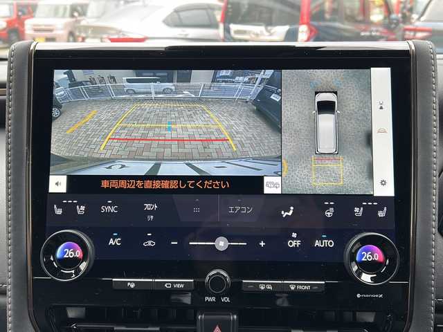 トヨタ ヴェルファイア ハイブリット Z プレミア 鳥取県 2025(令7)年 0.7万km ブラック 法人ワンオーナー/スマートキーx2個/パノラマルーフ/ブラックレザーシート/デジタルインナーミラー（ドラレコ）/メーカー14インチナビゲーション/フルセグ・HDMI/Bluetooth/フリップダウンモニター/セカンドオットマン/フロント・セカンドエアーシート/フロント・セカンドパワーシート/ウッドコンビハンドル（ヒーター）/ヘッドアップディスプレイ/パドルシフト/置くだけ充電/AC100V電源/電動サンシェード/両側パワースライド/パワーテールゲート/全方位カメラ/パーキングアシスト/インテリジェントソナー/プリクラッシュセーフティ/ブラインドスポットモニタリング/アダクティブクルーズ/オートハイビーム/LEDヘッドライト/クロムメッキ１９AW/ビルトインETC/保証書・スペアキー