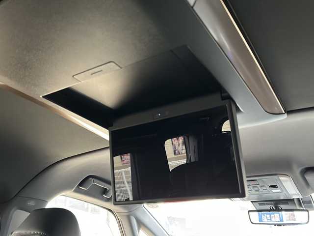 トヨタ ヴェルファイア ハイブリット Z プレミア 鳥取県 2025(令7)年 0.7万km ブラック 法人ワンオーナー/スマートキーx2個/パノラマルーフ/ブラックレザーシート/デジタルインナーミラー（ドラレコ）/メーカー14インチナビゲーション/フルセグ・HDMI/Bluetooth/フリップダウンモニター/セカンドオットマン/フロント・セカンドエアーシート/フロント・セカンドパワーシート/ウッドコンビハンドル（ヒーター）/ヘッドアップディスプレイ/パドルシフト/置くだけ充電/AC100V電源/電動サンシェード/両側パワースライド/パワーテールゲート/全方位カメラ/パーキングアシスト/インテリジェントソナー/プリクラッシュセーフティ/ブラインドスポットモニタリング/アダクティブクルーズ/オートハイビーム/LEDヘッドライト/クロムメッキ１９AW/ビルトインETC/保証書・スペアキー