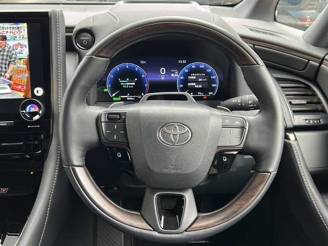 トヨタ ヴェルファイア ハイブリット Z プレミア 鳥取県 2025(令7)年 0.7万km ブラック 法人ワンオーナー/スマートキーx2個/パノラマルーフ/ブラックレザーシート/デジタルインナーミラー（ドラレコ）/メーカー14インチナビゲーション/フルセグ・HDMI/Bluetooth/フリップダウンモニター/セカンドオットマン/フロント・セカンドエアーシート/フロント・セカンドパワーシート/ウッドコンビハンドル（ヒーター）/ヘッドアップディスプレイ/パドルシフト/置くだけ充電/AC100V電源/電動サンシェード/両側パワースライド/パワーテールゲート/全方位カメラ/パーキングアシスト/インテリジェントソナー/プリクラッシュセーフティ/ブラインドスポットモニタリング/アダクティブクルーズ/オートハイビーム/LEDヘッドライト/クロムメッキ１９AW/ビルトインETC/保証書・スペアキー