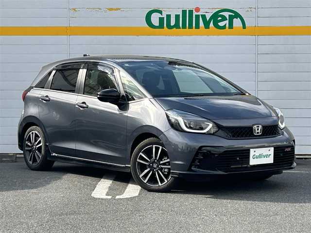 ホンダ フィット e:HEV RS 埼玉県 2024(令6)年 0.3万km メテオロイドグレーメタリック 純正ナビ/　(Bluetooth/iPod/AUX/USB/CD/DVD/FM/AM)/フルセグテレビ/バックカメラ/ビルトインETC/前後ドライブレコーダー/レーダークルーズコントロール/衝突被害軽減ブレーキ/車線逸脱警報/クリアランスソナー/パドルシフト/ハーフレザーシート/電子パーキングシステム/ブレーキホールド/オートLEDライト/純正フロアマット/純正16インチアルミホイール