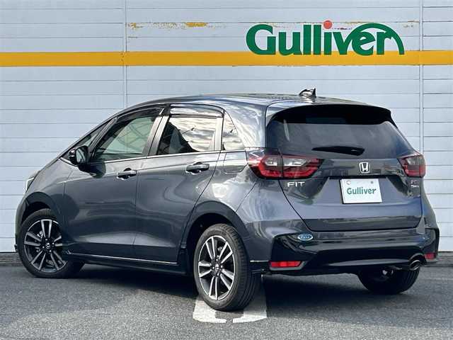 ホンダ フィット e:HEV RS 埼玉県 2024(令6)年 0.3万km メテオロイドグレーメタリック 純正ナビ/　(Bluetooth/iPod/AUX/USB/CD/DVD/FM/AM)/フルセグテレビ/バックカメラ/ビルトインETC/前後ドライブレコーダー/レーダークルーズコントロール/衝突被害軽減ブレーキ/車線逸脱警報/クリアランスソナー/パドルシフト/ハーフレザーシート/電子パーキングシステム/ブレーキホールド/オートLEDライト/純正フロアマット/純正16インチアルミホイール