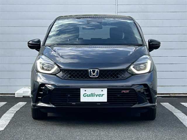 ホンダ フィット e:HEV RS 埼玉県 2024(令6)年 0.3万km メテオロイドグレーメタリック 純正ナビ/　(Bluetooth/iPod/AUX/USB/CD/DVD/FM/AM)/フルセグテレビ/バックカメラ/ビルトインETC/前後ドライブレコーダー/レーダークルーズコントロール/衝突被害軽減ブレーキ/車線逸脱警報/クリアランスソナー/パドルシフト/ハーフレザーシート/電子パーキングシステム/ブレーキホールド/オートLEDライト/純正フロアマット/純正16インチアルミホイール