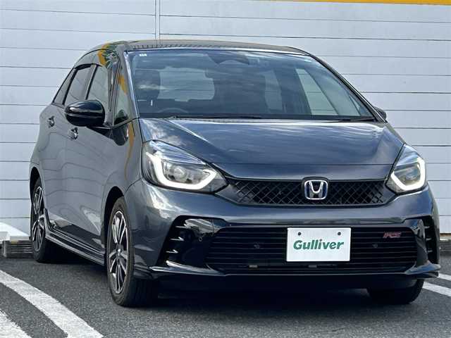 ホンダ フィット e:HEV RS 埼玉県 2024(令6)年 0.3万km メテオロイドグレーメタリック 純正ナビ/　(Bluetooth/iPod/AUX/USB/CD/DVD/FM/AM)/フルセグテレビ/バックカメラ/ビルトインETC/前後ドライブレコーダー/レーダークルーズコントロール/衝突被害軽減ブレーキ/車線逸脱警報/クリアランスソナー/パドルシフト/ハーフレザーシート/電子パーキングシステム/ブレーキホールド/オートLEDライト/純正フロアマット/純正16インチアルミホイール
