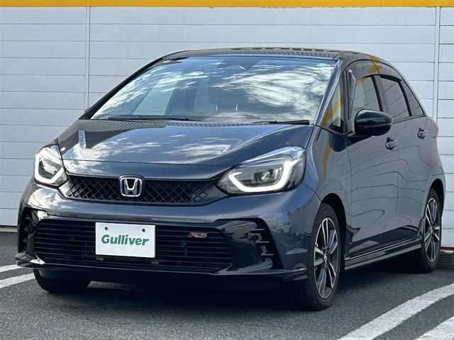 ホンダ フィット e:HEV RS 埼玉県 2024(令6)年 0.3万km メテオロイドグレーメタリック 純正ナビ/　(Bluetooth/iPod/AUX/USB/CD/DVD/FM/AM)/フルセグテレビ/バックカメラ/ビルトインETC/前後ドライブレコーダー/レーダークルーズコントロール/衝突被害軽減ブレーキ/車線逸脱警報/クリアランスソナー/パドルシフト/ハーフレザーシート/電子パーキングシステム/ブレーキホールド/オートLEDライト/純正フロアマット/純正16インチアルミホイール
