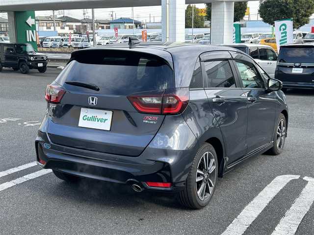 ホンダ フィット e:HEV RS 埼玉県 2024(令6)年 0.3万km メテオロイドグレーメタリック 純正ナビ/　(Bluetooth/iPod/AUX/USB/CD/DVD/FM/AM)/フルセグテレビ/バックカメラ/ビルトインETC/前後ドライブレコーダー/レーダークルーズコントロール/衝突被害軽減ブレーキ/車線逸脱警報/クリアランスソナー/パドルシフト/ハーフレザーシート/電子パーキングシステム/ブレーキホールド/オートLEDライト/純正フロアマット/純正16インチアルミホイール