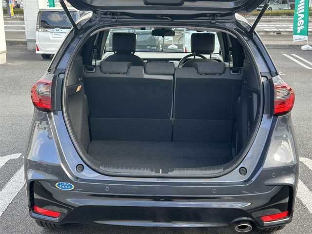 ホンダ フィット e:HEV RS 埼玉県 2024(令6)年 0.3万km メテオロイドグレーメタリック 純正ナビ/　(Bluetooth/iPod/AUX/USB/CD/DVD/FM/AM)/フルセグテレビ/バックカメラ/ビルトインETC/前後ドライブレコーダー/レーダークルーズコントロール/衝突被害軽減ブレーキ/車線逸脱警報/クリアランスソナー/パドルシフト/ハーフレザーシート/電子パーキングシステム/ブレーキホールド/オートLEDライト/純正フロアマット/純正16インチアルミホイール