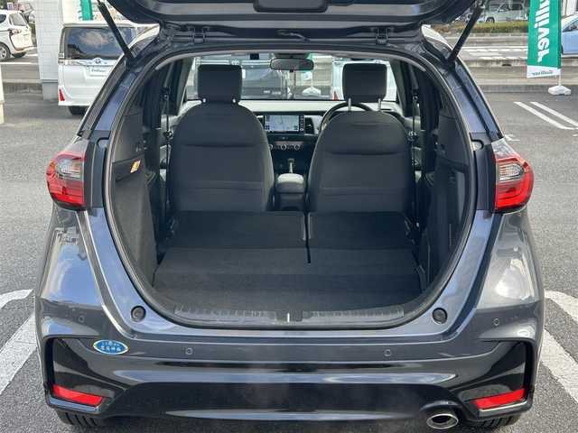 ホンダ フィット e:HEV RS 埼玉県 2024(令6)年 0.3万km メテオロイドグレーメタリック 純正ナビ/　(Bluetooth/iPod/AUX/USB/CD/DVD/FM/AM)/フルセグテレビ/バックカメラ/ビルトインETC/前後ドライブレコーダー/レーダークルーズコントロール/衝突被害軽減ブレーキ/車線逸脱警報/クリアランスソナー/パドルシフト/ハーフレザーシート/電子パーキングシステム/ブレーキホールド/オートLEDライト/純正フロアマット/純正16インチアルミホイール