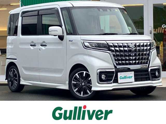 スズキ スペーシア カスタム HYBRID XS ターボ 静岡県 2023(令5)年 1.8万km ピュアホワイトP 純正９インチナビ(CD/DVD/BT/フルセグ)/全方位カメラ/ドライブレコーダー/ETC/パドルシフト/ターボ/レーダークルーズコントロール/スマートキー/スペアキー１本/USB入力端子/純正フロアマット/純正アルミホイール/両側パワースライドドア/ハーフレザーシート/D席シートヒーター/コーナーセンサー/レーンキープアシスト/盗難防止装置/オートライト/オートマチックハイビーム/LEDヘッドライト/W+サイドエアバッグ/衝突軽減システム/ヘッドアップディスプレイ/エンジンスタートボタン/パワーステアリング/パワーウィンドウ/アイドリングストップ/オートエアコン/ベンチシート/ABS