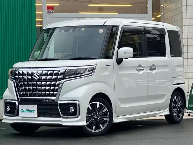 スズキ スペーシア カスタム HYBRID XS ターボ 静岡県 2023(令5)年 1.8万km ピュアホワイトP 純正９インチナビ(CD/DVD/BT/フルセグ)/全方位カメラ/ドライブレコーダー/ETC/パドルシフト/ターボ/レーダークルーズコントロール/スマートキー/スペアキー１本/USB入力端子/純正フロアマット/純正アルミホイール/両側パワースライドドア/ハーフレザーシート/D席シートヒーター/コーナーセンサー/レーンキープアシスト/盗難防止装置/オートライト/オートマチックハイビーム/LEDヘッドライト/W+サイドエアバッグ/衝突軽減システム/ヘッドアップディスプレイ/エンジンスタートボタン/パワーステアリング/パワーウィンドウ/アイドリングストップ/オートエアコン/ベンチシート/ABS
