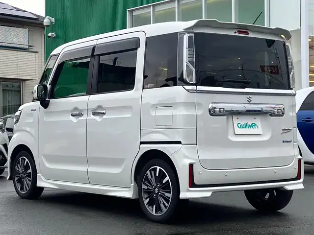 スズキ スペーシア カスタム HYBRID XS ターボ 静岡県 2023(令5)年 1.8万km ピュアホワイトP 純正９インチナビ(CD/DVD/BT/フルセグ)/全方位カメラ/ドライブレコーダー/ETC/パドルシフト/ターボ/レーダークルーズコントロール/スマートキー/スペアキー１本/USB入力端子/純正フロアマット/純正アルミホイール/両側パワースライドドア/ハーフレザーシート/D席シートヒーター/コーナーセンサー/レーンキープアシスト/盗難防止装置/オートライト/オートマチックハイビーム/LEDヘッドライト/W+サイドエアバッグ/衝突軽減システム/ヘッドアップディスプレイ/エンジンスタートボタン/パワーステアリング/パワーウィンドウ/アイドリングストップ/オートエアコン/ベンチシート/ABS