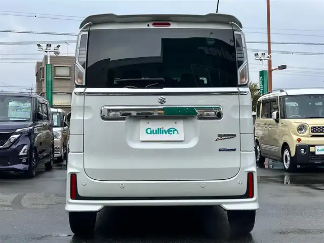 スズキ スペーシア カスタム HYBRID XS ターボ 静岡県 2023(令5)年 1.8万km ピュアホワイトP 純正９インチナビ(CD/DVD/BT/フルセグ)/全方位カメラ/ドライブレコーダー/ETC/パドルシフト/ターボ/レーダークルーズコントロール/スマートキー/スペアキー１本/USB入力端子/純正フロアマット/純正アルミホイール/両側パワースライドドア/ハーフレザーシート/D席シートヒーター/コーナーセンサー/レーンキープアシスト/盗難防止装置/オートライト/オートマチックハイビーム/LEDヘッドライト/W+サイドエアバッグ/衝突軽減システム/ヘッドアップディスプレイ/エンジンスタートボタン/パワーステアリング/パワーウィンドウ/アイドリングストップ/オートエアコン/ベンチシート/ABS