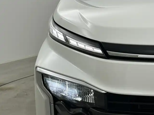 トヨタ ヴォクシー ハイブリッド S－Z 岡山県 2024(令6)年 2.5万km ホワイトパールクリスタルシャイン 純正10.5インチディスプレイオーディオ/「ナビ/CD/DVD/フルセグ/BT/HDMI/USB」/純正14インチフリップダウンモニター/型番:V14T-R72R/快適利便パッケージHigh/ミラー取付型デジタルインナーミラー/100V電源/バックカメラ/ブラインドスポットモニター/レーダークルーズコントロール/電動リアゲート/両側パワースライドドア/シートヒーター（1列目2列目）/ステアリングヒーター/オートハイビーム/LEDヘッドライト（AUTO機能付き）/ビルトインETC2.0/ドライブレコーダー（前後）/衝突軽減ブレーキシステム/横滑り防止装置/車線逸脱防止システム/コーナーセンサー（前後）/アイドリングストップ/スマートキー×2/取扱説明書/ナビ取扱説明書