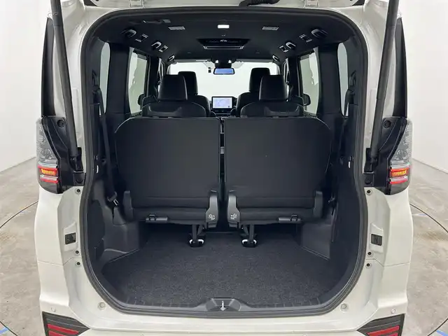 トヨタ ヴォクシー ハイブリッド S－Z 岡山県 2024(令6)年 2.5万km ホワイトパールクリスタルシャイン 純正10.5インチディスプレイオーディオ/「ナビ/CD/DVD/フルセグ/BT/HDMI/USB」/純正14インチフリップダウンモニター/型番:V14T-R72R/快適利便パッケージHigh/ミラー取付型デジタルインナーミラー/100V電源/バックカメラ/ブラインドスポットモニター/レーダークルーズコントロール/電動リアゲート/両側パワースライドドア/シートヒーター（1列目2列目）/ステアリングヒーター/オートハイビーム/LEDヘッドライト（AUTO機能付き）/ビルトインETC2.0/ドライブレコーダー（前後）/衝突軽減ブレーキシステム/横滑り防止装置/車線逸脱防止システム/コーナーセンサー（前後）/アイドリングストップ/スマートキー×2/取扱説明書/ナビ取扱説明書