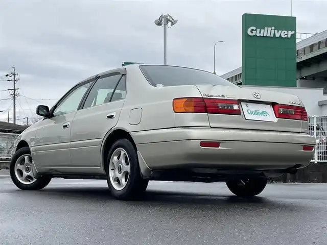 トヨタ コロナ プレミオ E－LTD ナビパッケージ 愛知県 2001(平13)年 6.6万km シャンパンM 純正DVDナビ/　・TV/　・CD/　・AM/FM/　・カセット/純正フロアマット/社外14インチAW/ハロゲンヘッドライト/リモコンキー/取扱説明書/保証書