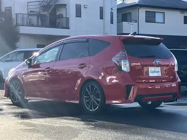 トヨタ プリウス α S ツーリングセレクション G’s 静岡県 2016(平28)年 2.2万km スーパーレッドⅤ 登録時21336km/車検R9年11月/ALPINE製9インチナビ/（CD/DVD/BT/フルセグ）/ALPINE製9インチ後席フリップダウンモニター/バックカメラ/BLITZ車高調 DAMPER_ZZ-R/FUJITSUBOマフラー/G’sフロアマット/G’sハーフレザーシート/G’sアルミホイール/横滑り防止装置/LEDオートヘッドライト/W+サイドエアバッグ/カーテンエアバッグ/GRsportドアハンドルプロテクター/carrozzeriaサブウ－ファ－(TS-WX70DA)/レーダー探知機（A110）/エンジンスタートボタン/アイドリングストップ/オートエアコン/ETC/ドライブレコーダー