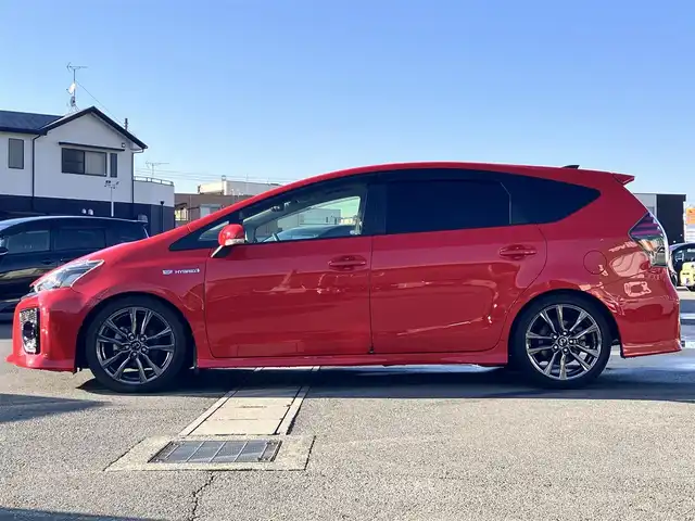 トヨタ プリウス α S ツーリングセレクション G’s 静岡県 2016(平28)年 2.2万km スーパーレッドⅤ 登録時21336km/車検R9年11月/ALPINE製9インチナビ/（CD/DVD/BT/フルセグ）/ALPINE製9インチ後席フリップダウンモニター/バックカメラ/BLITZ車高調 DAMPER_ZZ-R/FUJITSUBOマフラー/G’sフロアマット/G’sハーフレザーシート/G’sアルミホイール/横滑り防止装置/LEDオートヘッドライト/W+サイドエアバッグ/カーテンエアバッグ/GRsportドアハンドルプロテクター/carrozzeriaサブウ－ファ－(TS-WX70DA)/レーダー探知機（A110）/エンジンスタートボタン/アイドリングストップ/オートエアコン/ETC/ドライブレコーダー