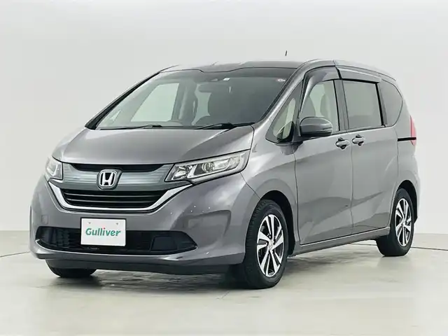 ホンダ フリード G ホンダセンシング 福島県 2018(平30)年 2.9万km モダンスティールM ホンダセンシング/・衝突軽減ブレーキ/・レーダークルーズコントロール/・車線逸脱警報/社外メモリーナビ/【AM/FM/DVD/CD/Bluetooth/フルセグ】/バックカメラ/ビルトインＥＴＣ/ステアリングリモコン/ハーフレザーシート/両側パワースライドドア/純正１５inアルミホイール/（スタッドレスタイヤ積込）/オートライト/・ＬＥＤライト/プッシュスタート/・スマートキー/・スペアキー/ウィンカーミラー/電動格納ミラー/ドアバイザー/フロアマット/新車保証書/取扱説明書（車両＆ナビ）