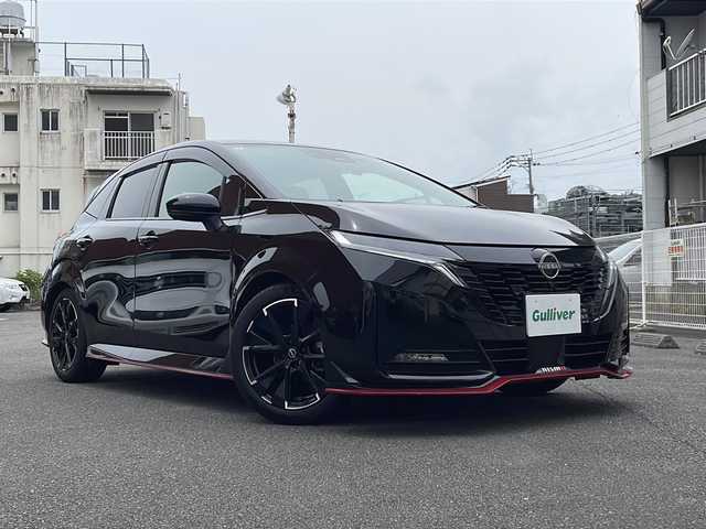 日産 オーラ ニスモ 宮崎県 2024(令6)年 0.6万km スーパーブラック ワンオーナー/登録時走行距離5259km/純正ナビ/（Apple Car Play/Android Auto/Bluetooth/HDMI/フルセグTV）/置くだけ充電/プロパイロット/アラウンドビューモニター/インテリジェントルームミラー/ステアリングヒーター/ビルトインETC/取説、記録簿/スペアキー１本