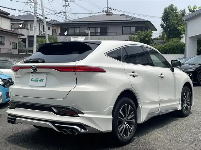 トヨタ ハリアー S 熊本県 2021(令3)年 2.8万km ホワイトパールクリスタルシャイン モデリスタエアロ/ナビ機能付きディスプレイオーディオ/【フルセグTV/BT/AM/FM/USB/AUX】/バックカメラ/トヨタセーフティセンス/・プリクラッシュセーフティ/・レーントレーシングアシスト/・クリアランスソナー/・パーキングサポートブレーキ/・ロードサインアシスト/・オートマチックハイビーム/レーダークルーズコントロール/純正18インチAW/革調シートカバー/オートホールド/前後ドライブレコーダー/ＬＥＤヘッドライト/オートライト/ヘッドライトレベライザー/ビルトインＥＴＣ/革巻きステアリング/ステアリングリモコン/社外フロアマット/取扱説明書/保証書