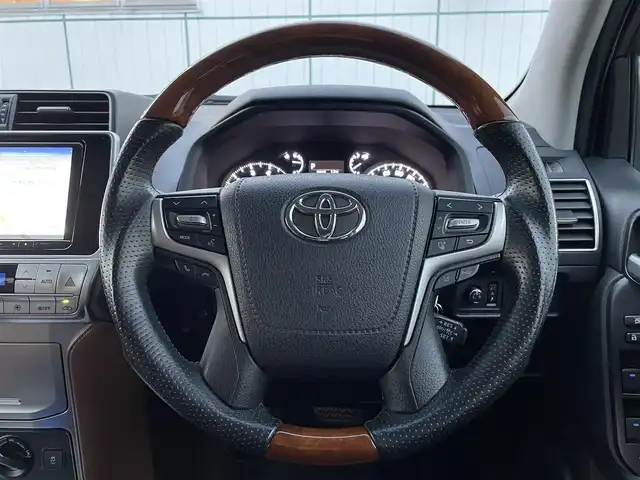 トヨタ ランドクルーザー プラド TX-L 70thアニバーサリーLTD 山梨県 2021(令3)年 4.8万km アバンギャルドブロンズメタリック ワンオーナー/サンルーフ/茶革シート/社外メモリナビ/CD/DVD/Bluetooth/フルセグTV/バックカメラ/ETC/ドライブレコーダー/前席パワーシート/前席シートヒーター/前席エアシート/レーダークルーズコントロール/スペアキー/取扱説明書/保証書