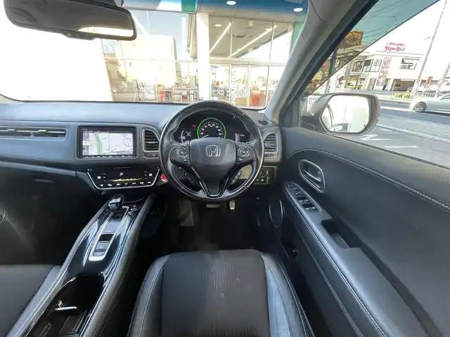 ホンダ ヴェゼル ハイブリッド Z ホンダセンシング 愛知県 2019(令1)年 16.6万km ミッドナイトブルービームM /ワンオーナー//禁煙車//純正ナビ・フルセグTV//Bluetooth・CD・DVD・AM・FM//スマートキー×２//保証書・取説//LEDフォグライト//カラードボディーロアーガーニッシュ//全ドアワンタッチ式パワーウインドウ//コンビシート＆専用インテリア//ラゲッジルームハードボード//運転席＆助手席シートヒーター//ルーフレール（FF）//パフォーマンスダンパー(R)//リバース連動ドアミラー（助手席側）//本革巻ステアリングホイール（スムースレザー）//雨滴検知式フロントワイパー//プラチナクロームメッキ加飾//17インチアルミホイール（スポーツタイプ）//エキパイフィニッシャー//自動防眩ルームミラー//前席用i-サイドエアバッグシステム＋サイドカーテンエアバッグシステム〈前席/後席対応〉//Honda SENSING//LEDヘッドライト〈インラインタイプ〉//左右独立温度コントロール式フルオート//エアコンディショナー//リアクティブフォースペダル//ハイブリッド専用デザインメーター//ナビ装着用スペシャルパッケージ＋ETC車載器//電子制御パーキングブレーキ//オートブレーキホールド機能