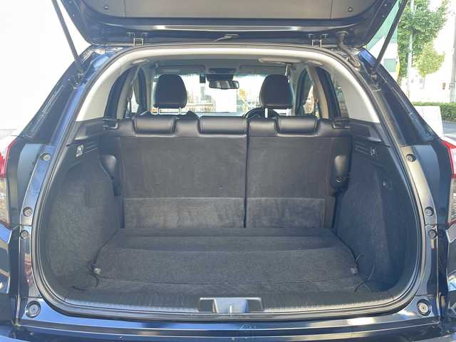 ホンダ ヴェゼル ハイブリッド Z ホンダセンシング 愛知県 2019(令1)年 16.6万km ミッドナイトブルービームM /ワンオーナー//禁煙車//純正ナビ・フルセグTV//Bluetooth・CD・DVD・AM・FM//スマートキー×２//保証書・取説//LEDフォグライト//カラードボディーロアーガーニッシュ//全ドアワンタッチ式パワーウインドウ//コンビシート＆専用インテリア//ラゲッジルームハードボード//運転席＆助手席シートヒーター//ルーフレール（FF）//パフォーマンスダンパー(R)//リバース連動ドアミラー（助手席側）//本革巻ステアリングホイール（スムースレザー）//雨滴検知式フロントワイパー//プラチナクロームメッキ加飾//17インチアルミホイール（スポーツタイプ）//エキパイフィニッシャー//自動防眩ルームミラー//前席用i-サイドエアバッグシステム＋サイドカーテンエアバッグシステム〈前席/後席対応〉//Honda SENSING//LEDヘッドライト〈インラインタイプ〉//左右独立温度コントロール式フルオート//エアコンディショナー//リアクティブフォースペダル//ハイブリッド専用デザインメーター//ナビ装着用スペシャルパッケージ＋ETC車載器//電子制御パーキングブレーキ//オートブレーキホールド機能