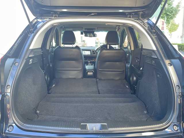 ホンダ ヴェゼル ハイブリッド Z ホンダセンシング 愛知県 2019(令1)年 16.6万km ミッドナイトブルービームM /ワンオーナー//禁煙車//純正ナビ・フルセグTV//Bluetooth・CD・DVD・AM・FM//スマートキー×２//保証書・取説//LEDフォグライト//カラードボディーロアーガーニッシュ//全ドアワンタッチ式パワーウインドウ//コンビシート＆専用インテリア//ラゲッジルームハードボード//運転席＆助手席シートヒーター//ルーフレール（FF）//パフォーマンスダンパー(R)//リバース連動ドアミラー（助手席側）//本革巻ステアリングホイール（スムースレザー）//雨滴検知式フロントワイパー//プラチナクロームメッキ加飾//17インチアルミホイール（スポーツタイプ）//エキパイフィニッシャー//自動防眩ルームミラー//前席用i-サイドエアバッグシステム＋サイドカーテンエアバッグシステム〈前席/後席対応〉//Honda SENSING//LEDヘッドライト〈インラインタイプ〉//左右独立温度コントロール式フルオート//エアコンディショナー//リアクティブフォースペダル//ハイブリッド専用デザインメーター//ナビ装着用スペシャルパッケージ＋ETC車載器//電子制御パーキングブレーキ//オートブレーキホールド機能