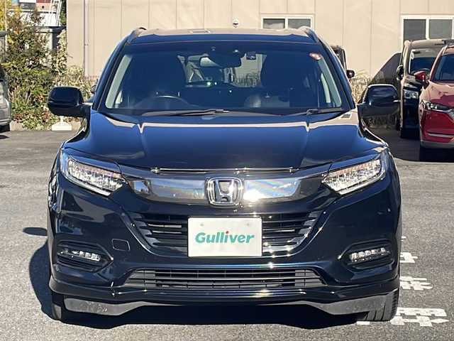ホンダ ヴェゼル ハイブリッド Z ホンダセンシング 愛知県 2019(令1)年 16.6万km ミッドナイトブルービームM /ワンオーナー//禁煙車//純正ナビ・フルセグTV//Bluetooth・CD・DVD・AM・FM//スマートキー×２//保証書・取説//LEDフォグライト//カラードボディーロアーガーニッシュ//全ドアワンタッチ式パワーウインドウ//コンビシート＆専用インテリア//ラゲッジルームハードボード//運転席＆助手席シートヒーター//ルーフレール（FF）//パフォーマンスダンパー(R)//リバース連動ドアミラー（助手席側）//本革巻ステアリングホイール（スムースレザー）//雨滴検知式フロントワイパー//プラチナクロームメッキ加飾//17インチアルミホイール（スポーツタイプ）//エキパイフィニッシャー//自動防眩ルームミラー//前席用i-サイドエアバッグシステム＋サイドカーテンエアバッグシステム〈前席/後席対応〉//Honda SENSING//LEDヘッドライト〈インラインタイプ〉//左右独立温度コントロール式フルオート//エアコンディショナー//リアクティブフォースペダル//ハイブリッド専用デザインメーター//ナビ装着用スペシャルパッケージ＋ETC車載器//電子制御パーキングブレーキ//オートブレーキホールド機能