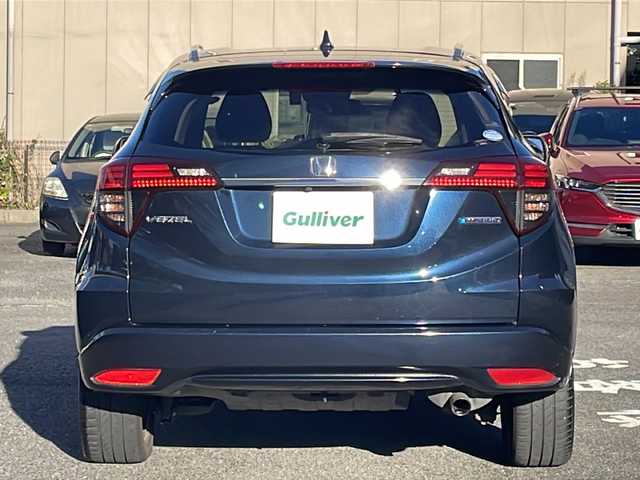 ホンダ ヴェゼル ハイブリッド Z ホンダセンシング 愛知県 2019(令1)年 16.6万km ミッドナイトブルービームM /ワンオーナー//禁煙車//純正ナビ・フルセグTV//Bluetooth・CD・DVD・AM・FM//スマートキー×２//保証書・取説//LEDフォグライト//カラードボディーロアーガーニッシュ//全ドアワンタッチ式パワーウインドウ//コンビシート＆専用インテリア//ラゲッジルームハードボード//運転席＆助手席シートヒーター//ルーフレール（FF）//パフォーマンスダンパー(R)//リバース連動ドアミラー（助手席側）//本革巻ステアリングホイール（スムースレザー）//雨滴検知式フロントワイパー//プラチナクロームメッキ加飾//17インチアルミホイール（スポーツタイプ）//エキパイフィニッシャー//自動防眩ルームミラー//前席用i-サイドエアバッグシステム＋サイドカーテンエアバッグシステム〈前席/後席対応〉//Honda SENSING//LEDヘッドライト〈インラインタイプ〉//左右独立温度コントロール式フルオート//エアコンディショナー//リアクティブフォースペダル//ハイブリッド専用デザインメーター//ナビ装着用スペシャルパッケージ＋ETC車載器//電子制御パーキングブレーキ//オートブレーキホールド機能