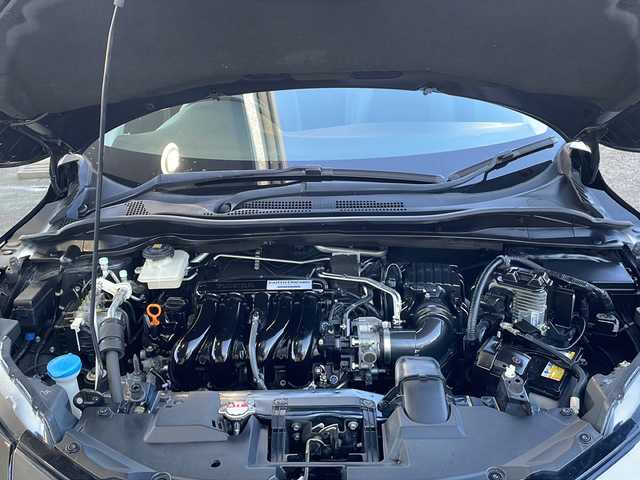 ホンダ ヴェゼル ハイブリッド Z ホンダセンシング 愛知県 2019(令1)年 16.6万km ミッドナイトブルービームM /ワンオーナー//禁煙車//純正ナビ・フルセグTV//Bluetooth・CD・DVD・AM・FM//スマートキー×２//保証書・取説//LEDフォグライト//カラードボディーロアーガーニッシュ//全ドアワンタッチ式パワーウインドウ//コンビシート＆専用インテリア//ラゲッジルームハードボード//運転席＆助手席シートヒーター//ルーフレール（FF）//パフォーマンスダンパー(R)//リバース連動ドアミラー（助手席側）//本革巻ステアリングホイール（スムースレザー）//雨滴検知式フロントワイパー//プラチナクロームメッキ加飾//17インチアルミホイール（スポーツタイプ）//エキパイフィニッシャー//自動防眩ルームミラー//前席用i-サイドエアバッグシステム＋サイドカーテンエアバッグシステム〈前席/後席対応〉//Honda SENSING//LEDヘッドライト〈インラインタイプ〉//左右独立温度コントロール式フルオート//エアコンディショナー//リアクティブフォースペダル//ハイブリッド専用デザインメーター//ナビ装着用スペシャルパッケージ＋ETC車載器//電子制御パーキングブレーキ//オートブレーキホールド機能