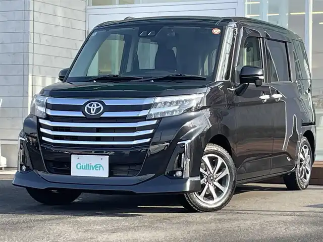 トヨタ ルーミー カスタムG 道央・札幌 2022(令4)年 0.7万km ブラックマイカメタリック ・４WD/・ワンオーナー/・寒冷地仕様/・衝突被害軽減システム/・社外メモリナビ/BＴ・ＵＳＢ・ＤＶＤ・ＣＤ・ＳＤ・ラジオ・ＨＤＭＩ/・両側パワースライドドア/・バックカメラ/・社外フリップダウンモニター/・積込み夏タイヤ/・レーダークルーズ/・コーナーセンサー/・純正エンジンスターター/・ビルトインETC/・前後ドライブレコーダー/・置くだけ充電/・シートヒーター/・フォグランプ/・保障書/・取扱説明書