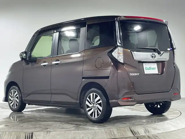 トヨタ ルーミー カスタムG 福岡県 2022(令4)年 1.1万km プラムブラウンパールクリスタルシャイン プッシュスタート/両側パワースライドドア/アイドリングストップ/オートブレーキホールド/純正LEDヘッドライト/シートヒーター/ドアバイザー/フォグランプ/保証書/スペアキー