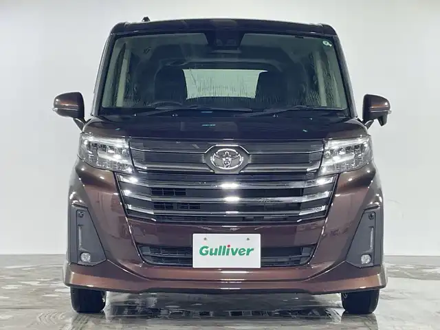 トヨタ ルーミー カスタムG 福岡県 2022(令4)年 1.1万km プラムブラウンパールクリスタルシャイン プッシュスタート/両側パワースライドドア/アイドリングストップ/オートブレーキホールド/純正LEDヘッドライト/シートヒーター/ドアバイザー/フォグランプ/保証書/スペアキー