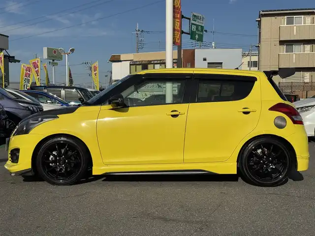スズキ スイフト スポーツ 千葉県 2014(平26)年 3.1万km チャンピオンイエロー 6速MT/社外シフトノブ/モンスタースポーツ製カーボンボンネット/モンスタースポーツ製カーボングリル/モンスタースポーツ製フロントハーフカーボンエアロ/モンスタースポーツ製サスペンション/モンスタースポーツ製リアカーボンスポイラー/HKS製マフラー(車検対応)/リアフォグランプ/G-SPEED17インチAW/社外ナビ/バックカメラ/AM/FM/CD/DVD/BT/フルセグTV/ビルトインETC/前方ドラレコ/カロッツェリア音響(ツイーター・サブウーハー)搭載/HIDヘッドライト/スマートキー/プッシュスタート/社外フロアマット