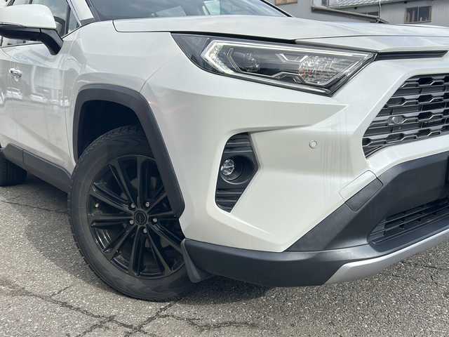 トヨタ ＲＡＶ４ ハイブリットG 福井県 2020(令2)年 8万km ホワイトパールクリスタルシャイン ワンオーナー/パノラマルーフ/アルパイン８インチメモリナビゲーション/フルセグテレビ/バックカメラ/プリクラッシュセーフティ/レーンキープアシスト/アダプティブクルーズコントロール/ブラインドスポットモニター/社外１８インチアルミホイール/（純正アルミホイール見込みあり）/D席パワーシート/黒革シート/パワーシート/パワーバックドア/シートヒーター/ルーフレール/ETC/前後ドライブレコーダー/スマートキー/プッシュスタート/保証書/取扱説明書