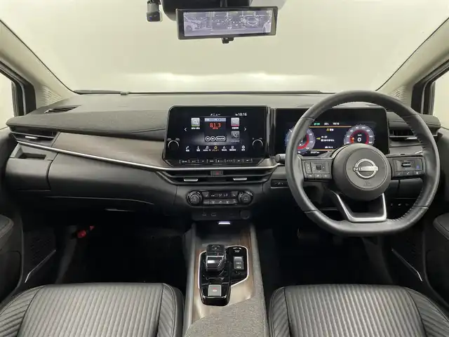 日産 オーラ G FOUR レザーエディション 福井県 2022(令4)年 2.6万km ピュアホワイトパール / スーパーブラック 2トーン BOSEサウンドシステム/純正ナビ/【フルセグ/AM/FM/Bluetooth】/全方位支援システム/アラウンドビューモニター/インテリジェントルームミラー/インテリジェントエマージェンシーブレーキ/プロパイロット/標識検知支援/ルート減速支援/ステアリングヒーター/ビルトインETC2.0/クルーズコントロール/純正アルミホイール１７インチ/前方ドライブレコーダー/純正フロアマット