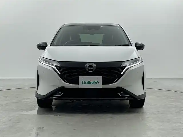 日産 オーラ G FOUR レザーエディション 福井県 2022(令4)年 2.6万km ピュアホワイトパール / スーパーブラック 2トーン BOSEサウンドシステム/純正ナビ/【フルセグ/AM/FM/Bluetooth】/全方位支援システム/アラウンドビューモニター/インテリジェントルームミラー/インテリジェントエマージェンシーブレーキ/プロパイロット/標識検知支援/ルート減速支援/ステアリングヒーター/ビルトインETC2.0/クルーズコントロール/純正アルミホイール１７インチ/前方ドライブレコーダー/純正フロアマット