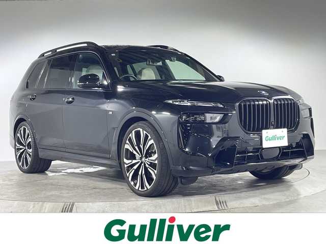 ＢＭＷ ＢＭＷ Ｘ７ xDrive40d Mスポーツ 福岡県 2023(令5)年 0.9万km サファイアブラックP ワンオーナー/Mスポーツパッケージ/スカイラウンジパノラマガラスサンルーフ/ドライビング・アシスト・プロフェッショナル/BMWコックピット/ヘッドアップディスプレイ/harman/kardonサウンドシステム/iDriveナビゲーションシステム/トップビューカメラ/アルカンターラシート/シートヒーター/シートベンチレーション/パワーシート/純正23インチアルミホイール/Mカーボンファーバーインテリアトリム/ブラックキドニーグリル/温冷機能付きカップホルダー/LEDヘッドライト/コンフォートアクセス/パワーバックドア/エアサスペンション