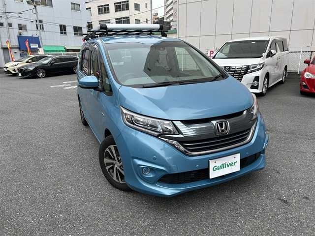 ホンダ フリード ハイブリット EX 神奈川県 2019(平31)年 4.5万km ブルーホライゾンM ワンオーナー/純正9インチナビ/・フルセグTV/・CD/DVD/SD/・Bluetooth/USB/HDMI/・AM/FM/バックカメラ/純正11.6インチフリップダウンモニター/衝突軽減ブレーキ/アクティブクルーズコントロール/レーンキープアシストシステム/ビルトインETC/両側パワースライドドア/コーナーセンサー/シートヒーター/LEDヘッドライト/フォグライト/ECON/スマートキーｘ２/取扱説明書/保証書