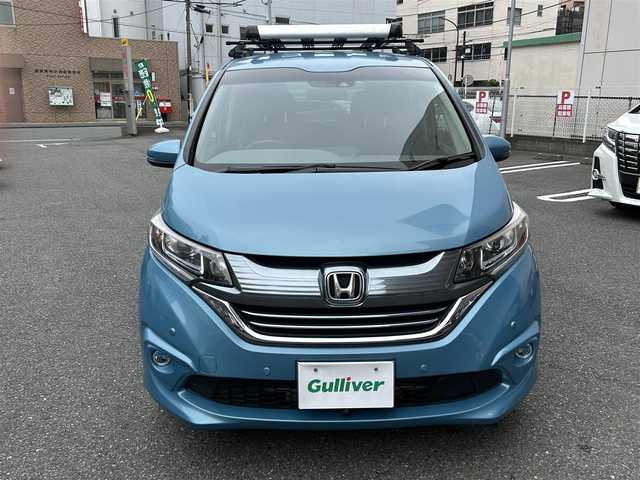 ホンダ フリード ハイブリット EX 神奈川県 2019(平31)年 4.5万km ブルーホライゾンM ワンオーナー/純正9インチナビ/・フルセグTV/・CD/DVD/SD/・Bluetooth/USB/HDMI/・AM/FM/バックカメラ/純正11.6インチフリップダウンモニター/衝突軽減ブレーキ/アクティブクルーズコントロール/レーンキープアシストシステム/ビルトインETC/両側パワースライドドア/コーナーセンサー/シートヒーター/LEDヘッドライト/フォグライト/ECON/スマートキーｘ２/取扱説明書/保証書