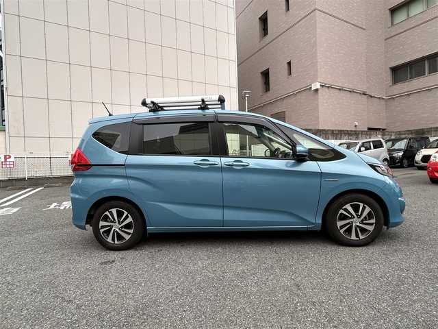 ホンダ フリード ハイブリット EX 神奈川県 2019(平31)年 4.5万km ブルーホライゾンM ワンオーナー/純正9インチナビ/・フルセグTV/・CD/DVD/SD/・Bluetooth/USB/HDMI/・AM/FM/バックカメラ/純正11.6インチフリップダウンモニター/衝突軽減ブレーキ/アクティブクルーズコントロール/レーンキープアシストシステム/ビルトインETC/両側パワースライドドア/コーナーセンサー/シートヒーター/LEDヘッドライト/フォグライト/ECON/スマートキーｘ２/取扱説明書/保証書