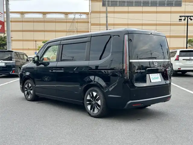 ホンダ ステップワゴン eHEV エアー 宮城県 2022(令4)年 5.2万km クリスタルブラックパール 登録時走行距離51970km/純正ナビ/FM・AM・TV・Bluetooth/両側パワースライドドア/バックカメラ/衝突軽減システム/レーンキープアシスト/クルーズコントロール（追従走行あり）/コーナーセンサー（前後）/プッシュスタート/LED/ビルトインETC/純正アルミホイール/純正フロアマット/後席スモーク/電子制御シフト/ヘッドライトレベライザー/ドアバイザー/ウインカーミラー