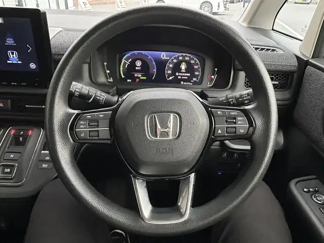 ホンダ ステップワゴン eHEV エアー 宮城県 2022(令4)年 5.2万km クリスタルブラックパール 登録時走行距離51970km/純正ナビ/FM・AM・TV・Bluetooth/両側パワースライドドア/バックカメラ/衝突軽減システム/レーンキープアシスト/クルーズコントロール（追従走行あり）/コーナーセンサー（前後）/プッシュスタート/LED/ビルトインETC/純正アルミホイール/純正フロアマット/後席スモーク/電子制御シフト/ヘッドライトレベライザー/ドアバイザー/ウインカーミラー