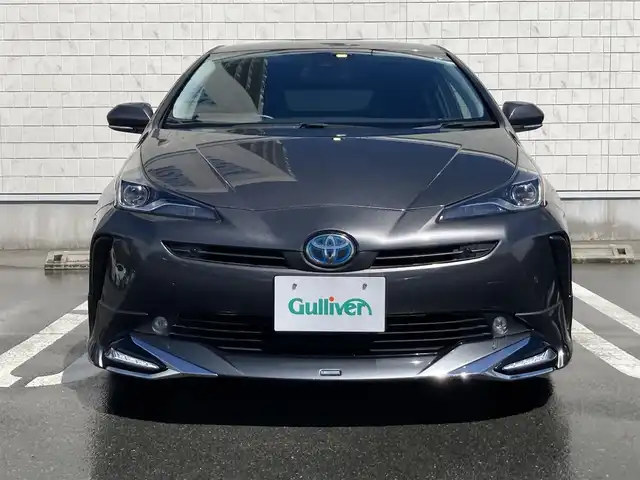 トヨタ プリウス A 静岡県 2019(令1)年 4.4万km グレーメタリック Toyota Safety Sense/社外SDナビ(CN-RE05D)/　AM FM CD DVD Bluetooth/フルセグTV/バックモニター/ビルトインETC/LEDオートヘッドランプ/モデリスタエアロ/パワーシート(運転席)/レーダークルーズコントロール/ヘッドアップディスプレイ/前後方クリアランスソナー/純正15インチアルミホイール/スマートキー2本/プッシュスタート/ドライブモードセレクト
